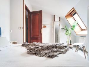 A bed or beds in a room at Playa de Raxó, al lado de Sanxenxo