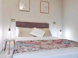A bed or beds in a room at Playa de Raxó, al lado de Sanxenxo