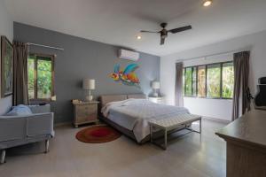 Ένα ή περισσότερα κρεβάτια σε δωμάτιο στο Amazing 4BR house with private pool +16 φωτογραφίες
