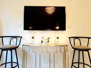 TV a/nebo společenská místnost v ubytování Salalah Hawana Marina Apartment