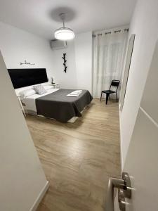 Posteľ alebo postele v izbe v ubytovaní Apartamento Gloria 1 Parking privado gratis