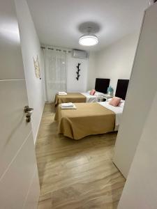 Posteľ alebo postele v izbe v ubytovaní Apartamento Gloria 1 Parking privado gratis