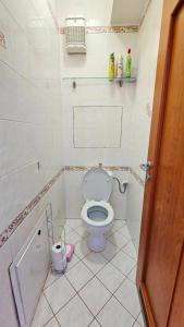a bathroom with a toilet in a room at Apartmán Bulvár in Žilina +9 photos