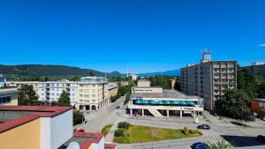 an aerial view of a city with buildings and a street at Apartmán Bulvár in Žilina