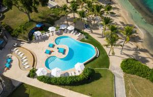 an aerial view of a resort with a swimming pool at The Buccaneer Beach & Golf Resort in Christiansted