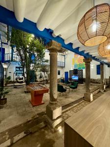 Posezení v ubytování Way Kap Hostel Cusco