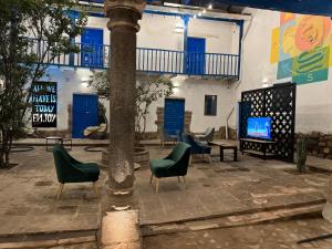 Posezení v ubytování Way Kap Hostel Cusco