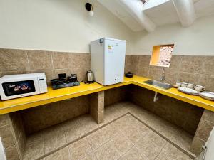 Kuchyň nebo kuchyňský kout v ubytování Way Kap Hostel Cusco