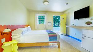 TV a/nebo společenská místnost v ubytování The Siesta Motel