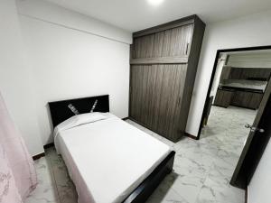 Ένα ή περισσότερα κρεβάτια σε δωμάτιο στο Apartamento Acogedor y Moderno 2