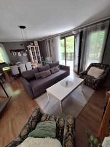 Posezení v ubytování House Kupa MB