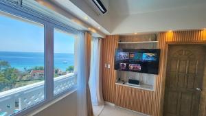 TV a/nebo společenská místnost v ubytování La Mirada Residences + 37 fotografií