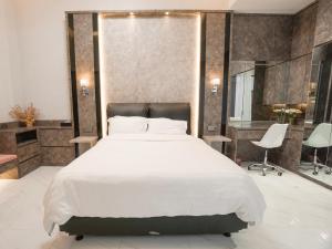Postel nebo postele na pokoji v ubytování Premium Room + 5 fotografií