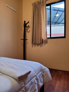 Postel nebo postele na pokoji v ubytování Casa Colon Quito Bed & Breakfast Hostel