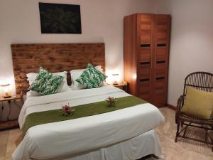 Postel nebo postele na pokoji v ubytování Fern Lodge Self Catering