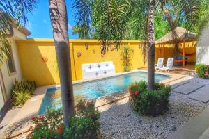 สระว่ายน้ำที่อยู่ใกล้ ๆ หรือใน Casa Cocoa - 3 Br Home In Playa Langosta