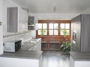 a kitchen with a sink and a counter top at Wehner Comfortable holiday residence in Marl