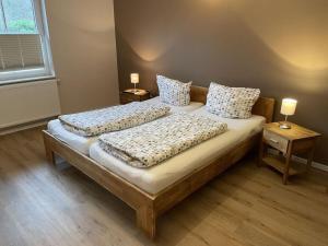 Postel nebo postele na pokoji v ubytování Alter Badweg Holiday Apartment 1