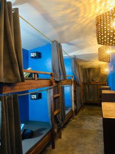 a group of bunk beds in a room at Jaydy hostel in General Luna