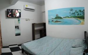 Postel nebo postele na pokoji v ubytování Hotel shalom taganga
