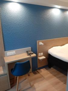 Postel nebo postele na pokoji v ubytování Brit Hotel Mulhouse Centre
