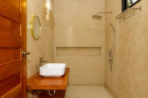 a bathroom with a sink and a shower at 2br Seaview pool villa B in Hinkong +40 photos