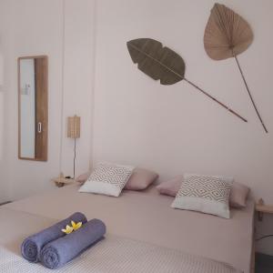 Ліжко або ліжка в номері Sastro Place