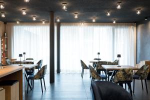 Posezení v ubytování DOLOMITI EXCLUSIVE YOUR MOUNTAIN SUITE