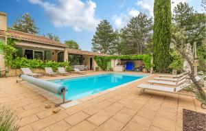 a swimming pool with a slide in a yard at Gorgeous Home In Callian With Wifi in Callian +38 photos