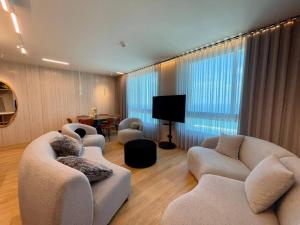 Μια τηλεόραση ή/και κέντρο ψυχαγωγίας στο Carmel Holiday Apartments