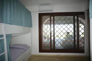 Letto o letti in una camera di Kite Hostel Stagnone