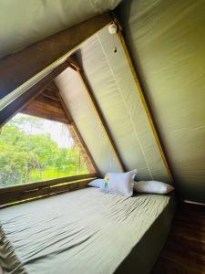 Letto o letti in una camera di The Forest Edge Resort