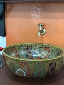a sink with a faucet on top of it at Luxury Stay with Breakfast & en-suite Bathroom in George Town