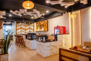 Cucina o angolo cottura di Drishya Hotel