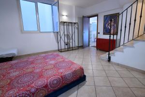 A bed or beds in a room at Villetta Panoramica con Giardino a Riccione
