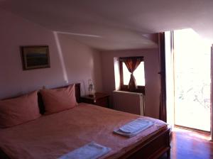 Кровать или кровати в номере Casa Germanoff