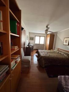 Postel nebo postele na pokoji v ubytování Mansarda di Charme a Verona