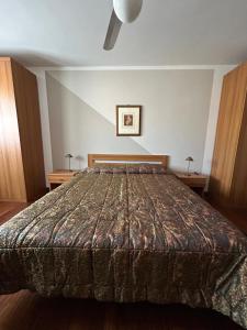 Postel nebo postele na pokoji v ubytování Mansarda di Charme a Verona