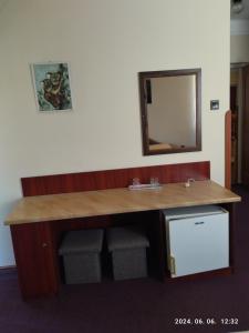 a bathroom counter with a sink and a mirror at Start Panzió-Étterem in Hajdúszoboszló +44 photos