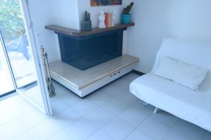 A seating area at Villetta Panoramica con Giardino a Riccione
