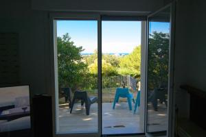 A balcony or terrace at Villetta Panoramica con Giardino a Riccione