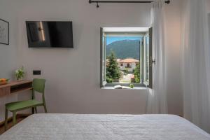 Postel nebo postele na pokoji v ubytování Arca Deorum