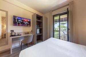 Postel nebo postele na pokoji v ubytování Hotel Acapulco