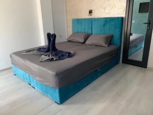 Postel nebo postele na pokoji v ubytování Neversea house