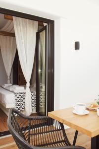 Giường trong phòng chung tại Rodillo Apartments