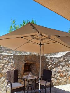 Patio alebo iná vonkajšia časť ubytovania Ambiente