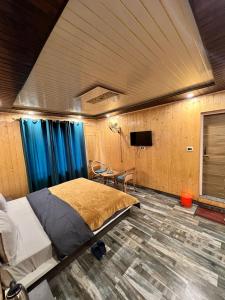TV a/nebo společenská místnost v ubytování SONAMARG SNOW VIEW