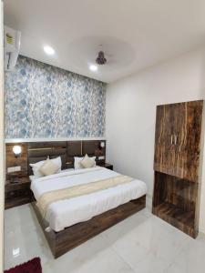 Voodi või voodid majutusasutuse Hotel GS Grand Amritsar toas