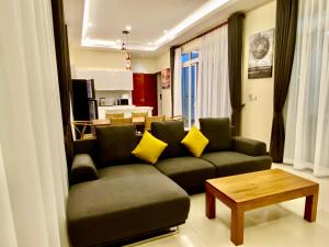 Posezení v ubytování Ban Khun Tu Pool Villa