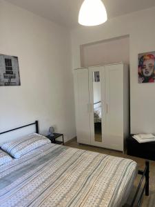 A bed or beds in a room at Il Fante locazione turistica